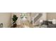 Spacious living room with hardwood floors and staircase at 5736 Birtz Rd, Indianapolis, IN 46216