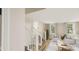 Living room with stairs, light flooring, and sofas at 5736 Birtz Rd, Indianapolis, IN 46216