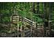 Wooden stairs leading up a wooded hillside at 5736 Birtz Rd, Indianapolis, IN 46216