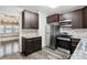 Modern kitchen with stainless steel appliances and granite countertops at 3005 Broadway St, Indianapolis, IN 46205