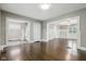 Hardwood floors, open floor plan, and views to entryway and formal dining area at 3005 Broadway St, Indianapolis, IN 46205