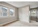 Bright bedroom with neutral walls and carpet at 3005 Broadway St, Indianapolis, IN 46205