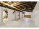 Unfinished basement with high ceilings and ample storage at 3005 Broadway St, Indianapolis, IN 46205