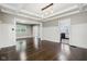 Spacious dining room with hardwood floors and decorative ceiling at 3005 Broadway St, Indianapolis, IN 46205
