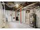 Unfinished basement with laundry hookups at 3005 Broadway St, Indianapolis, IN 46205