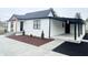 White brick home with covered porch and walkway at 2068 S Avon Ave, Avon, IN 46123