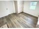 Functional laundry room with built-in cabinets and vinyl flooring at 2068 S Avon Ave, Avon, IN 46123