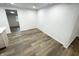 Bright dining area with hardwood floors and access to another room at 2068 S Avon Ave, Avon, IN 46123