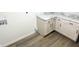 Bright laundry room featuring marble countertops and vinyl flooring at 2068 S Avon Ave, Avon, IN 46123