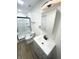 Modern bathroom with gray vanity, walk-in shower, and updated fixtures at 2068 S Avon Ave, Avon, IN 46123
