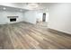 Finished basement with LVP flooring and stone fireplace at 2068 S Avon Ave, Avon, IN 46123