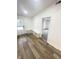 Inviting entryway with built-in bench seating and hardwood floors at 2068 S Avon Ave, Avon, IN 46123