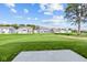 Spacious backyard with a view of the community and open green space at 10620 Banyan Wood Ct, Indianapolis, IN 46239