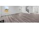 Bright living room with hardwood floors and staircase at 10620 Banyan Wood Ct, Indianapolis, IN 46239