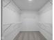 Large walk-in closet with wire shelving at 10620 Banyan Wood Ct, Indianapolis, IN 46239