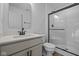 Clean bathroom, featuring a vanity with a sink, toilet, and shower at 10620 Banyan Wood Ct, Indianapolis, IN 46239