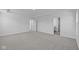 Spacious bedroom with carpet flooring and access to a private bathroom at 10620 Banyan Wood Ct, Indianapolis, IN 46239