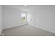 Bright bedroom with carpet, a window and a door to a closet at 10620 Banyan Wood Ct, Indianapolis, IN 46239