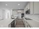 Open concept kitchen with island and stainless steel appliances at 10620 Banyan Wood Ct, Indianapolis, IN 46239