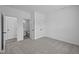 Bright bedroom with carpet, doors to closets and bathroom at 10620 Banyan Wood Ct, Indianapolis, IN 46239