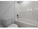 Bathroom with a bathtub, shower, and toilet at 10620 Banyan Wood Ct, Indianapolis, IN 46239