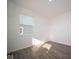 Simple bedroom with hardwood floors and a window at 7888 Magnolia St, New Palestine, IN 46163