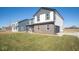 Two-story house with partial view of neighboring homes at 7888 Magnolia St, New Palestine, IN 46163