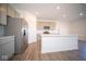 Modern kitchen with stainless steel appliances and an island at 7888 Magnolia St, New Palestine, IN 46163