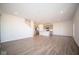 Open concept kitchen with gray cabinets and island at 7888 Magnolia St, New Palestine, IN 46163