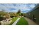 Landscaped side yard with artificial turf and play area at 4270 Victoria Ln, Avon, IN 46123