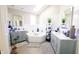 Spa-like bathroom with double vanity, large soaking tub, and LED lighting at 4270 Victoria Ln, Avon, IN 46123