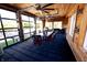 Bright sunroom with glass walls and dining table at 4270 Victoria Ln, Avon, IN 46123