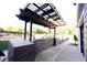 Outdoor kitchen with a pergola and stone counter at 4270 Victoria Ln, Avon, IN 46123