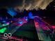 Lighted backyard putting green with landscaping at 4270 Victoria Ln, Avon, IN 46123