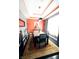 Modern dining room with a statement wall and stylish rug at 4270 Victoria Ln, Avon, IN 46123