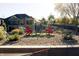 Landscaped backyard with a seating area and views of the main house at 4270 Victoria Ln, Avon, IN 46123