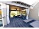Covered patio features comfortable seating and string lights at 4270 Victoria Ln, Avon, IN 46123