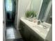 Simple bathroom with a single vanity and access to another room at 4270 Victoria Ln, Avon, IN 46123
