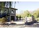 Landscaped backyard with a basketball court and modern wooden fence at 4270 Victoria Ln, Avon, IN 46123