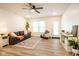 Bright living room featuring a comfortable couch and accent chair at 1431 Coen Ct, Columbus, IN 47201