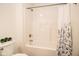 Clean bathroom with a tub, shower, and white vanity at 1431 Coen Ct, Columbus, IN 47201