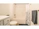 Clean bathroom with a tub, shower, and white vanity at 1431 Coen Ct, Columbus, IN 47201