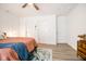 Serene bedroom with a queen bed, three closets, and ceiling fan at 1431 Coen Ct, Columbus, IN 47201