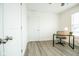 Bright office with a desk, chair, and window with blinds at 1431 Coen Ct, Columbus, IN 47201