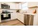 Clean kitchen with white cabinets and stainless steel appliances at 1431 Coen Ct, Columbus, IN 47201