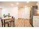Bright eat-in kitchen with stainless steel appliances and light wood flooring at 1431 Coen Ct, Columbus, IN 47201