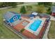 Aerial view of a backyard with a pool, patio, and shed at 4525 S Deck Rd, Gosport, IN 47433