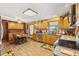 Bright kitchen with oak cabinets, stainless steel appliances, and an island at 4525 S Deck Rd, Gosport, IN 47433