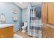 Clean bathroom with shower, toilet and vanity at 4525 S Deck Rd, Gosport, IN 47433
