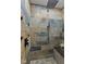 Spa-like shower with multi-head shower fixture and slate tile at 4525 S Deck Rd, Gosport, IN 47433